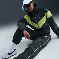 Nike Sportswear Windrunner жіноча Woven Pants колір зелений