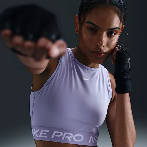 Nike Pro жіноча Dri-FIT Cropped Tank Top колір фіолетовий