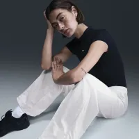 Nike Sportswear Everything Wovens жіноча Mid-Rise Open-Hem Pants колір білий