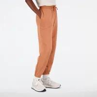Штани New Balance WP31508SEI - Оранжеві