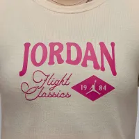 Nike Jordan жіноча Graphic Slim футболка колір коричневий