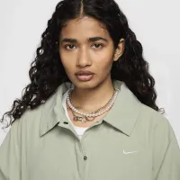 Nike Sportswear Essential жіноча оверсайз UV Woven Coaches' Куртка колір зелений