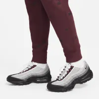 Nike Club Fleece чоловічі Brushed-Back Allover Print Joggers колір червоний