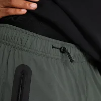 Nike Tech чоловічі Woven оверсайз Pants колір зелений