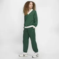 Nike Sportswear Essential женская Loose UV Woven Long-Sleeve V-Neck Top цвет зеленый