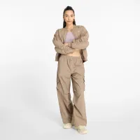 Штани New Balance WP43534LMR - Бежевий