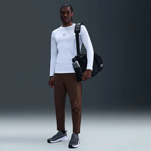 Nike Unlimited чоловічі Dri-FIT Tapeколір червоний Leg Versatile Pants колір коричневий