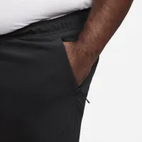 Nike Unlimited мужские Dri-FIT Tapeцвет красный Leg Versatile Pants цвет черный