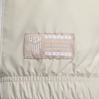 U.S. Essential женская Nike Graphic Куртка цвет коричневый
