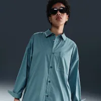 Nike Sportswear Chill Poplin жіноча Loose Long-Sleeve Button-Up Top блакитний