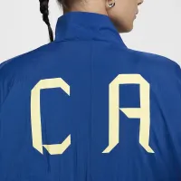 Club Америка Essential жіноча Nike Soccer Woven Куртка блакитний