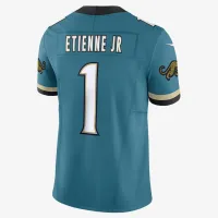 Travis Etienne Jr. Jacksonville Jaguars мужские Nike Dri-FIT NFL Limited Football Jersey цвет зеленый