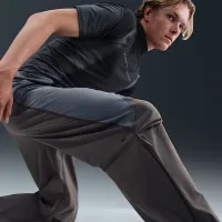 Nike Tech чоловічі Dri-FIT Woven Color-Block Loose-Fit Pants колір сірий
