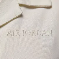 Nike Air Jordan женская Long-Sleeve Woven Top цвет белый