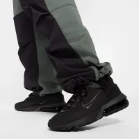 Nike Tech чоловічі Woven оверсайз Pants колір зелений