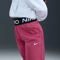 Nike Pro Fleece Big детские (Girls') Dri-FIT Joggers цвет фиолетовый
