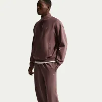 Nike Solo Swoosh мужские Cuffed Fleece Pants цвет фиолетовый