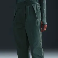 Nike Sportswear Collection жіноча Mid-Rise Repel Asymmetrical-Waist Trousers колір зелений