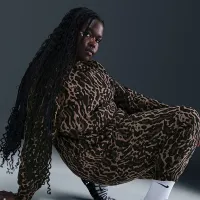 Nike Sportswear Phoenix Fleece женская оверсайз Printed Crew-Neck свитшот (большие размеры) цвет черный