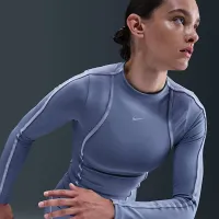 Nike One Fitted жіноча Dri-FIT Long-Sleeve Top блакитний