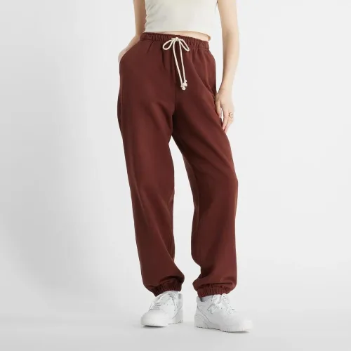 Штани New Balance WP41513ROK - Бежеві