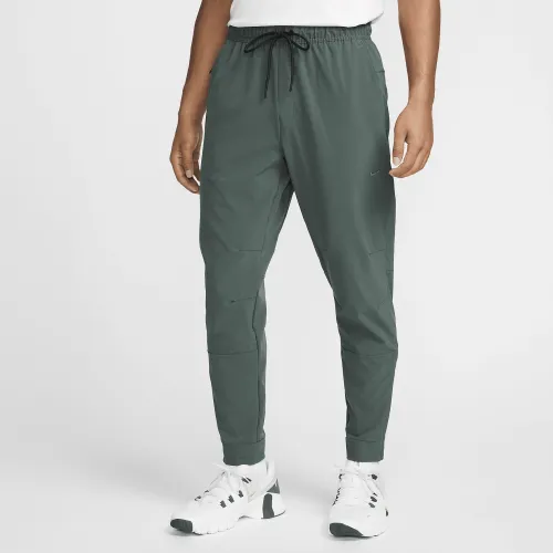 Nike Unlimited чоловічі Dri-FIT Zippeколір червоний Cuff Versatile Pants колір зелений