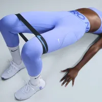 Nike Pro Sculpt жіноча З високою талією 7/8 лосіни з кишенямиблакитний