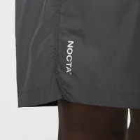 Nike NOCTA Cardinal Nylon шорти колір сірий