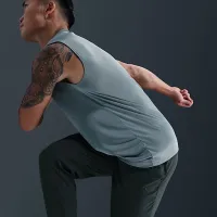 Nike Unlimited мужские Dri-FIT Tapeцвет красный Leg Versatile Pants цвет зеленый